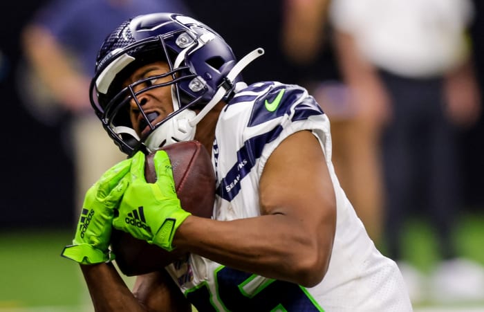 Seattle Seahawks wide receiver Tyler Lockett (16) catches a touchdown pass against New Orleans Saints cornerback Paulson Adebo (29) during the second half at Caesars Superdome.
